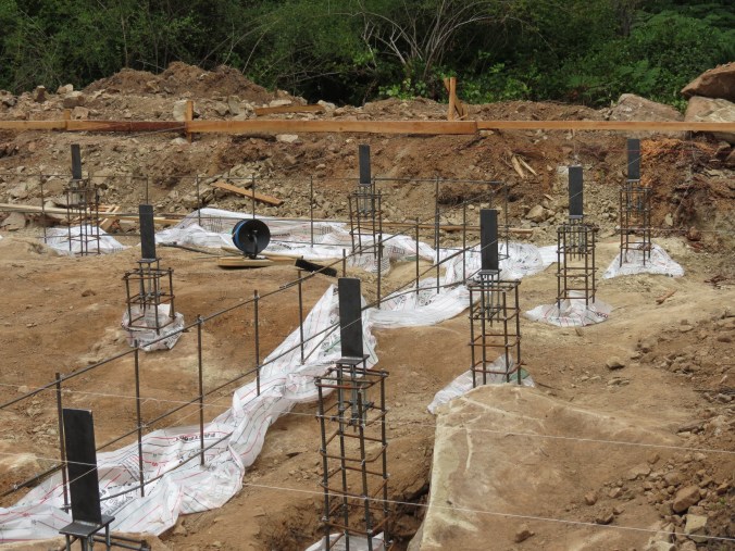 Pier rebar and custom post tie-downs wired in place