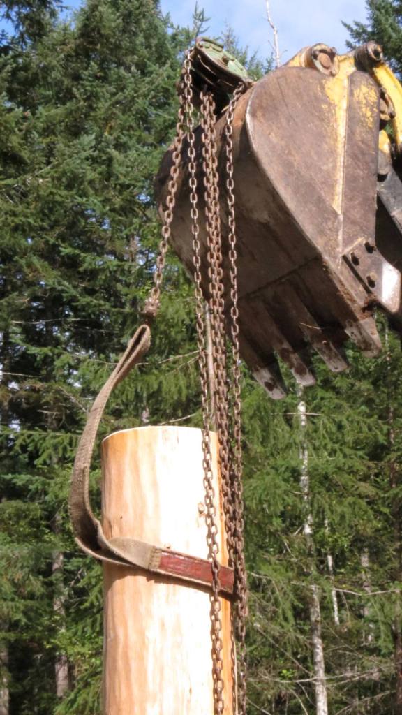 Easing it over the blade with the chain block