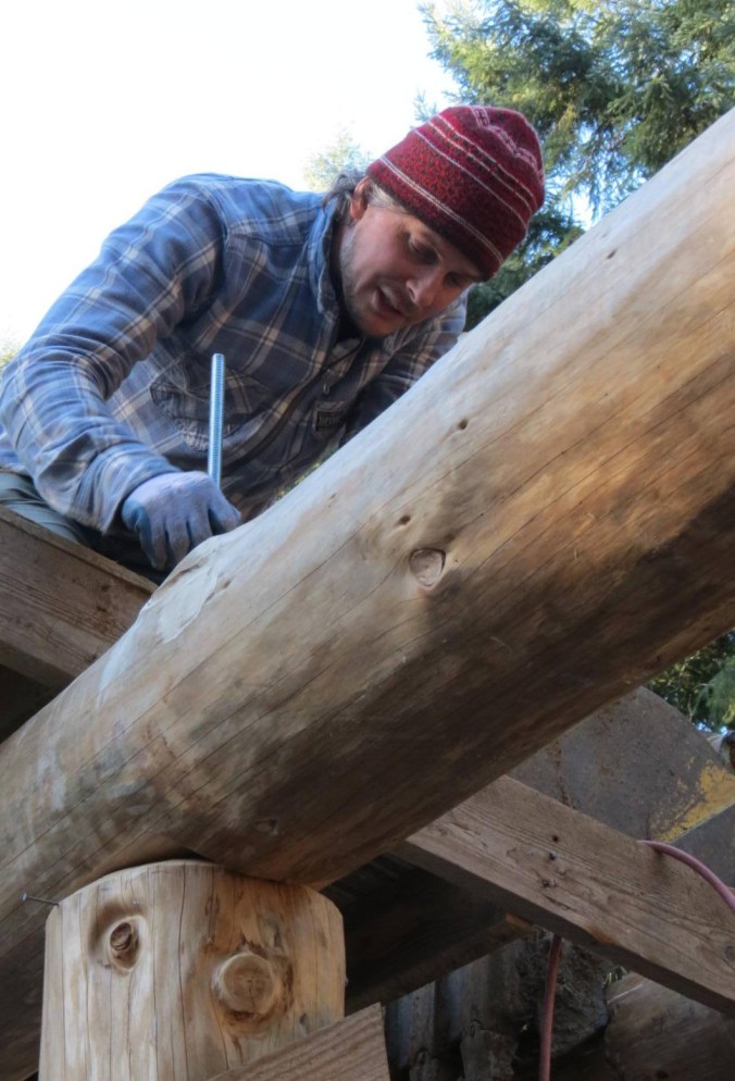 Threading the rod into the backer